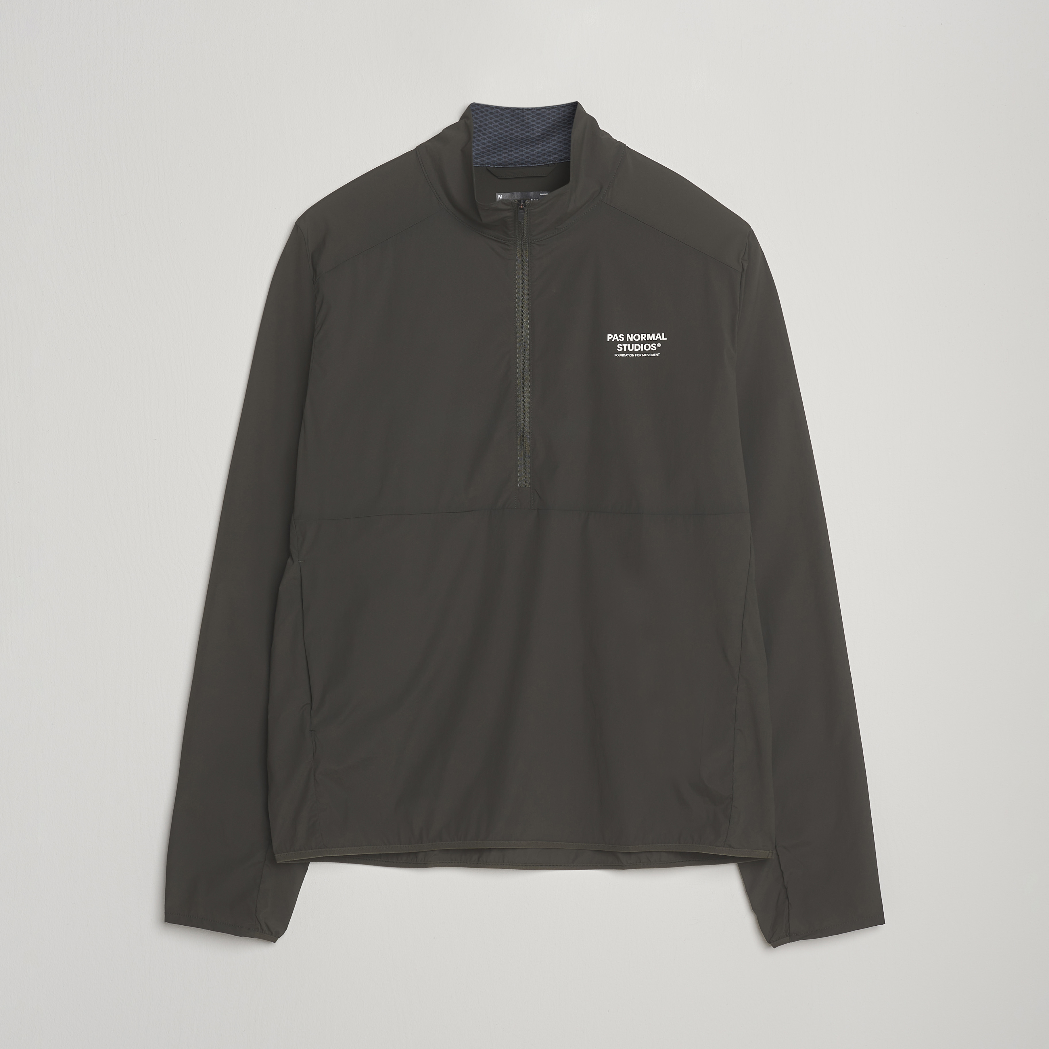 Normal Zip Pas Normal Studios Balance Half Zip Jacket Dark Olive su CareOfCarl.it