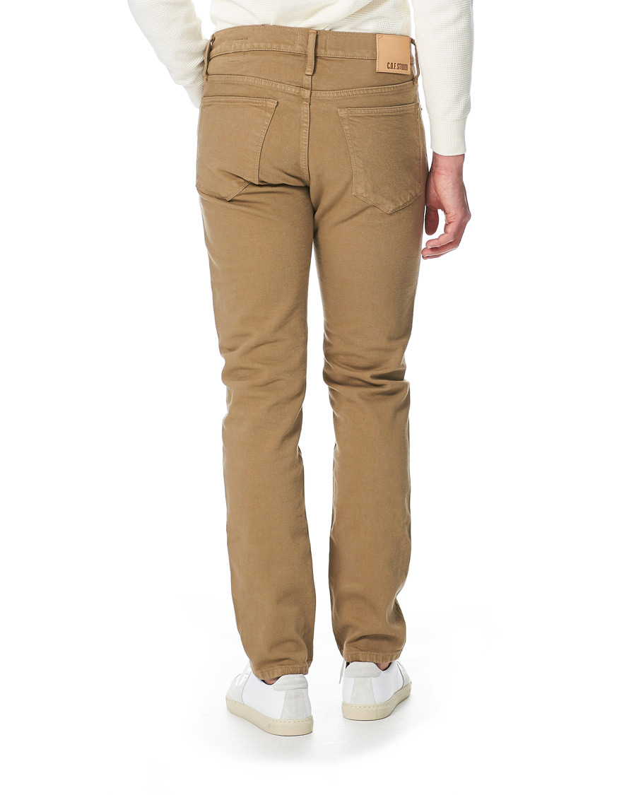 Uomini | Jeans | C.O.F. Studio | M7 Tapered Organic Cotton Stretch Jeans Khaki Beige