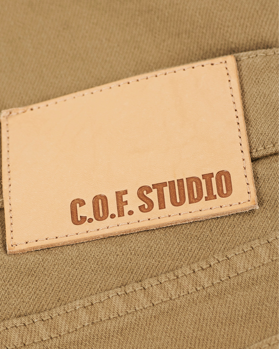 Uomini | Jeans | C.O.F. Studio | M7 Tapered Organic Cotton Stretch Jeans Khaki Beige