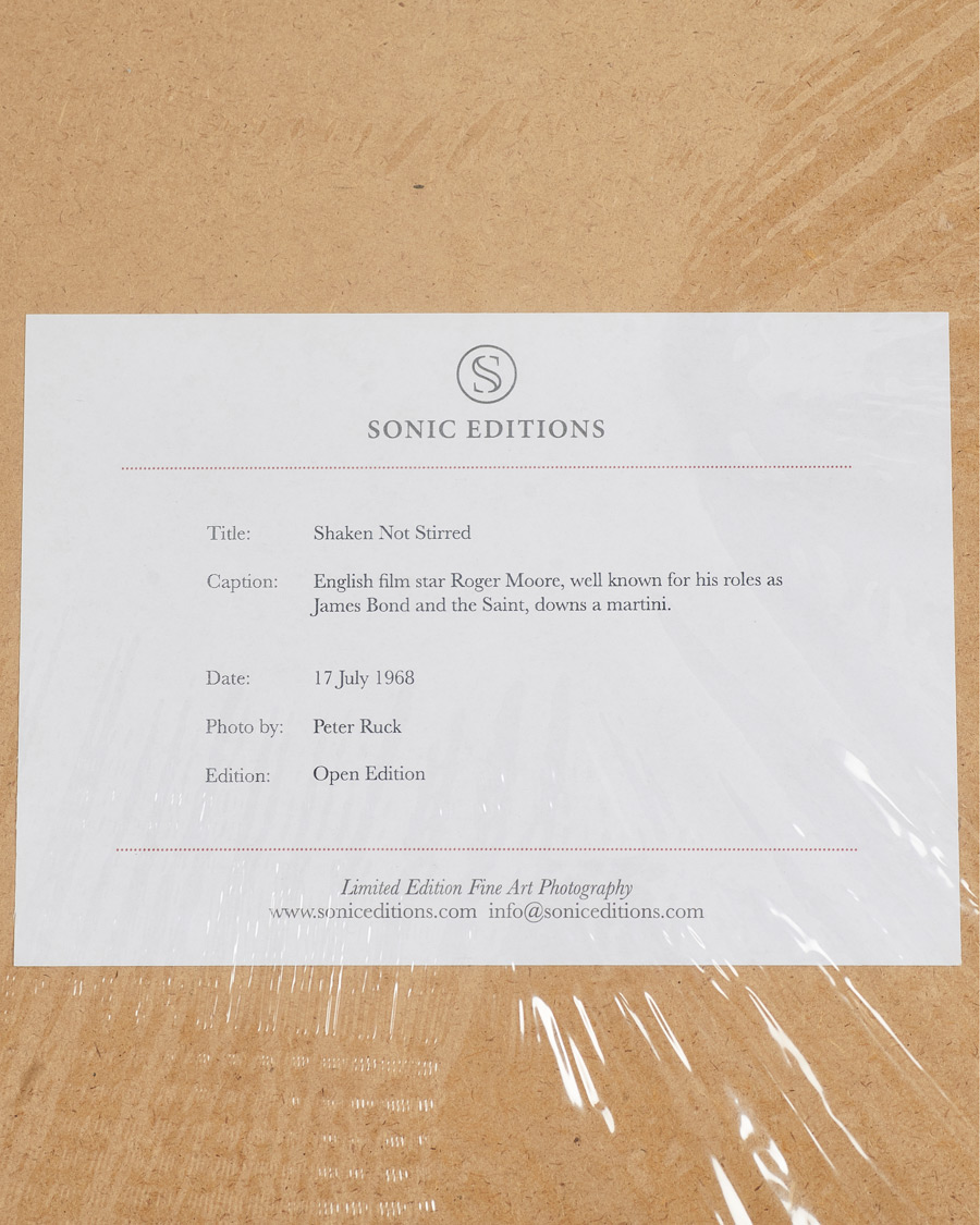 Uomini | Poster | Sonic Editions | Framed Roger Moore Shaken Not Stirred