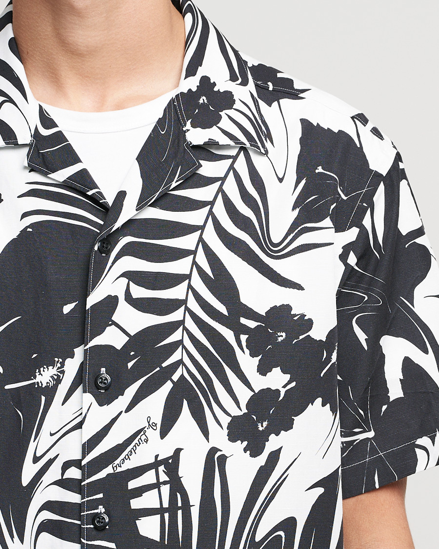 Uomini | Camicie | J.Lindeberg | Elio Hibiscus Print Short Sleeve Shirt White/Black