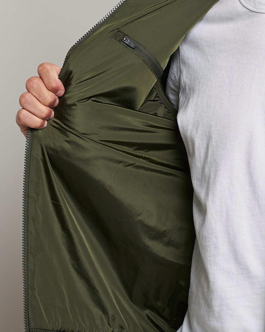 Uomini | Maglieria | J.Lindeberg | Pierre Knitted Hybrid Full Zip Hood Forest Green