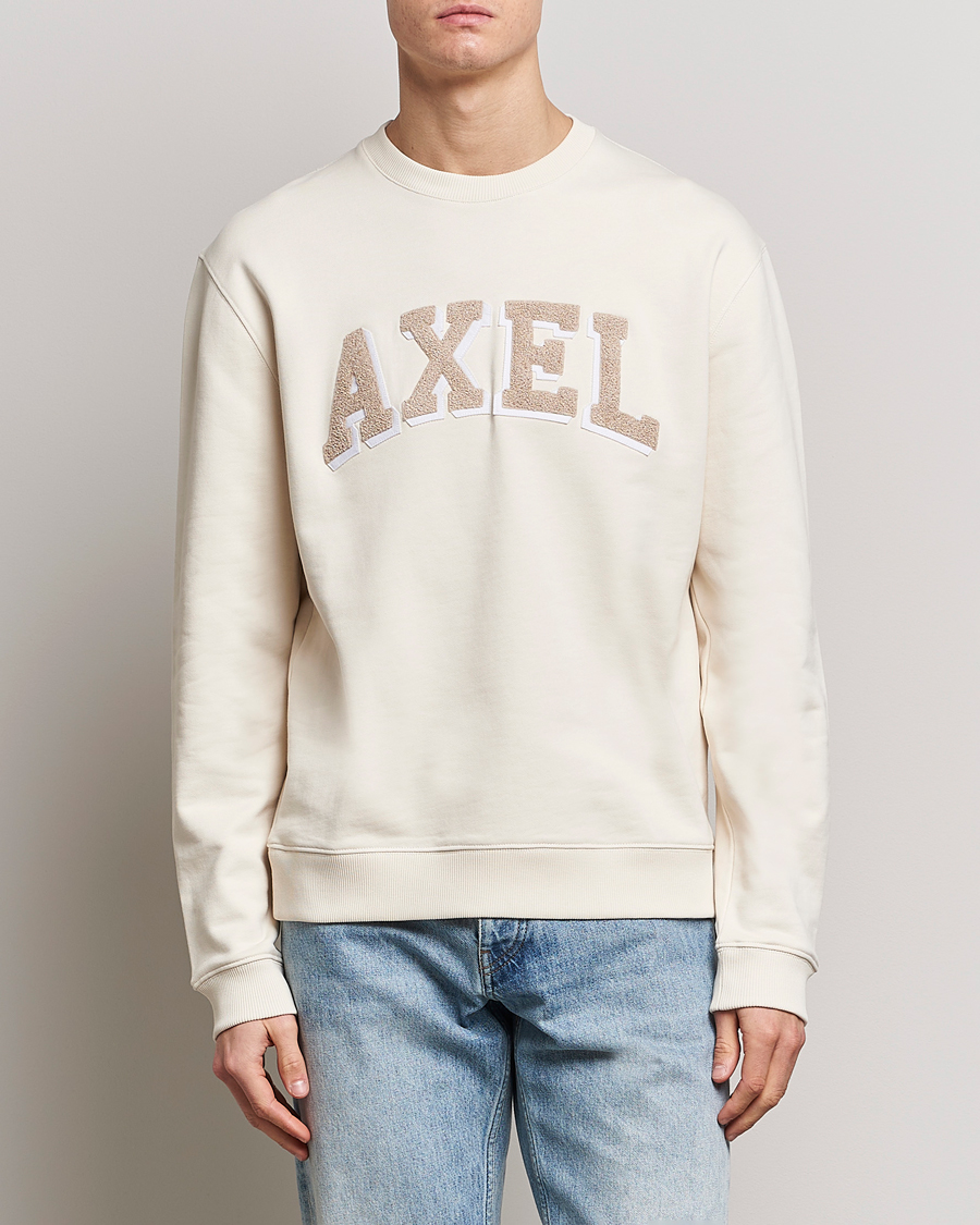Uomini | Maglieria | Axel Arigato | Axel Arc Sweatshirt Pale Beige