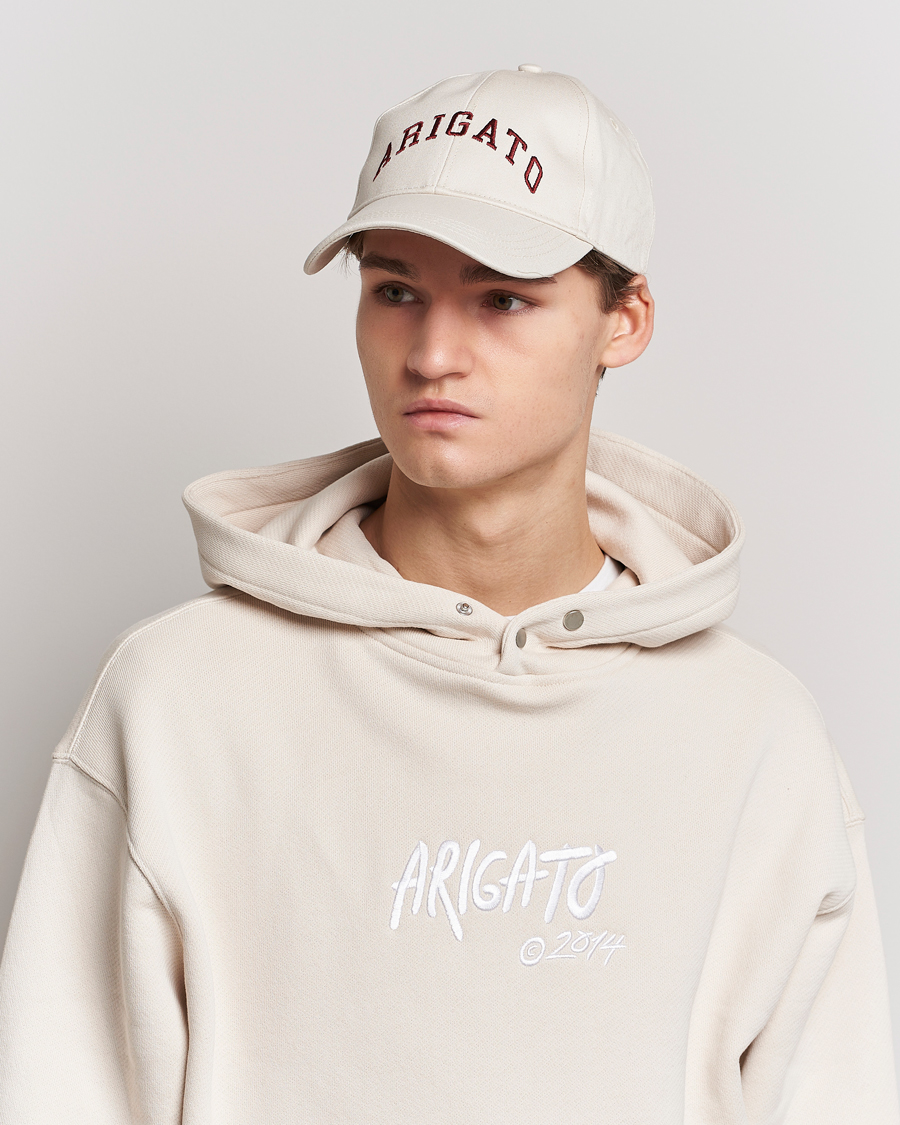 Uomini | Axel Arigato College Arigato Cap Pale Beige | Axel Arigato | College Arigato Cap Pale Beige