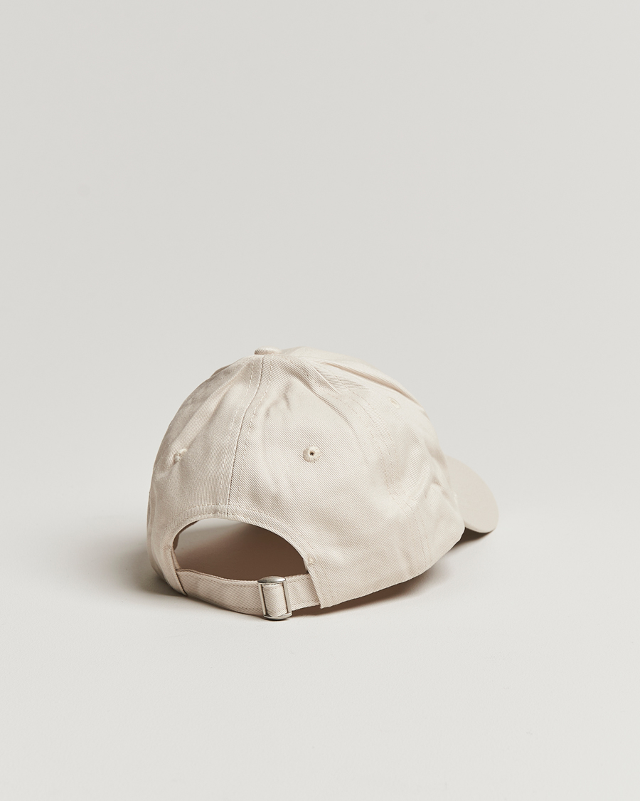 Uomini | Axel Arigato College Arigato Cap Pale Beige | Axel Arigato | College Arigato Cap Pale Beige