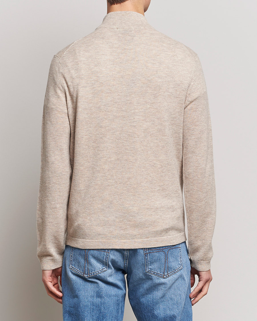 Uomini | Maglieria | Tiger of Sweden | Owain Merino Half Zip Sweater Dark White