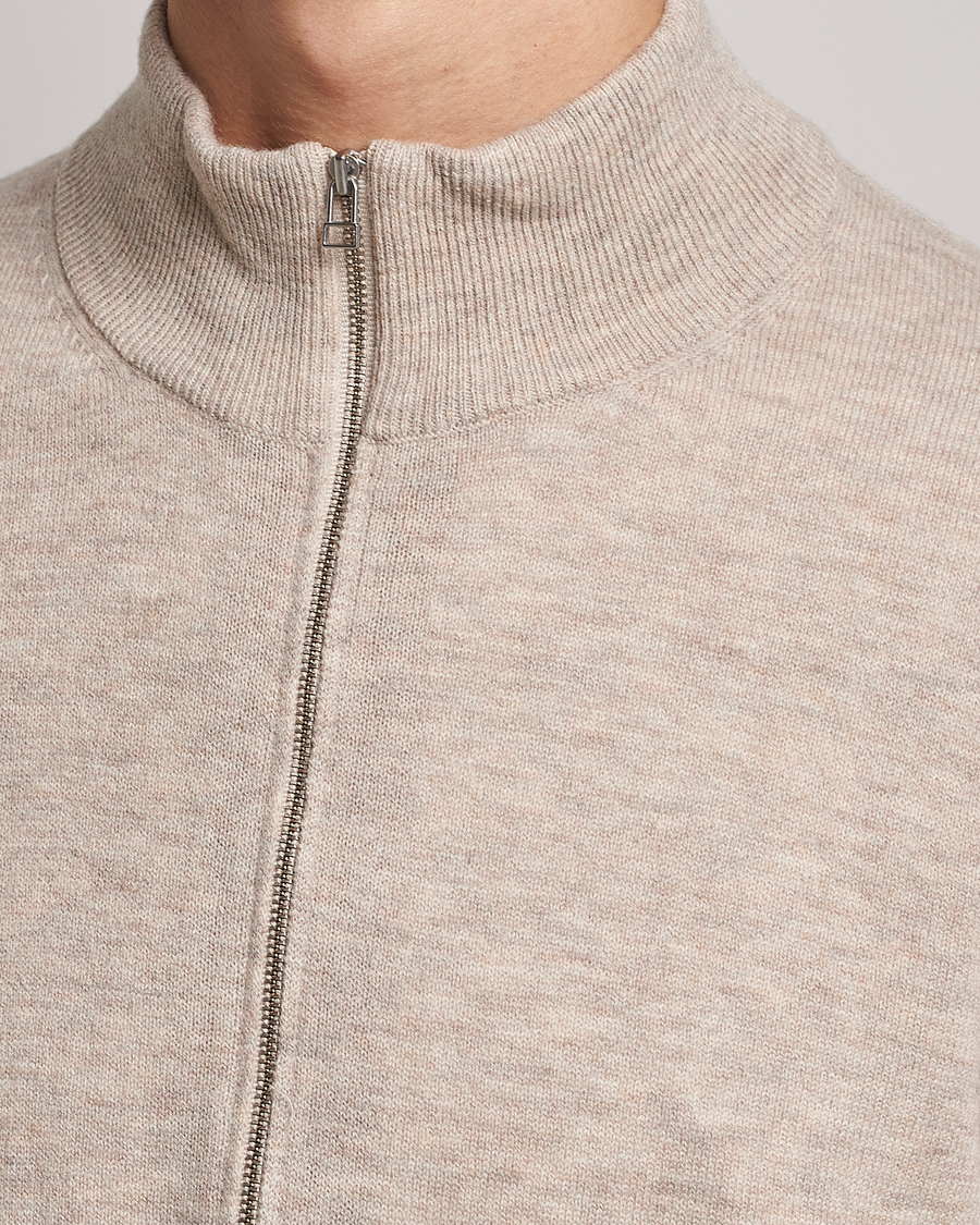 Uomini | Maglieria | Tiger of Sweden | Owain Merino Half Zip Sweater Dark White