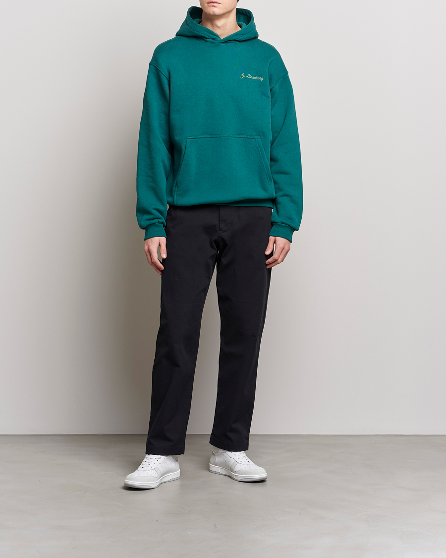 Uomini | Maglieria | J.Lindeberg | Karson Graphic Organic Cotton Hoodie Rain Forest