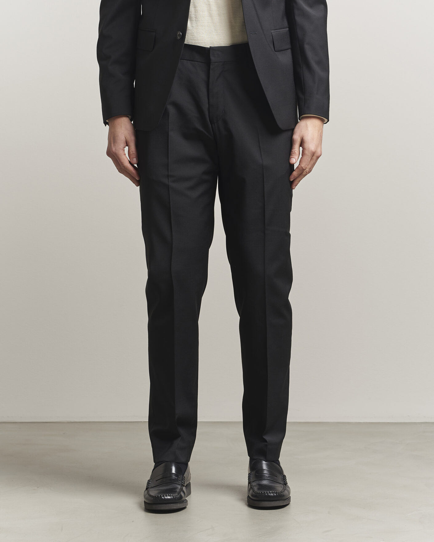 Uomini | Pantaloni | Tiger of Sweden | Tenuta Wool Travel Suit Trousers Black