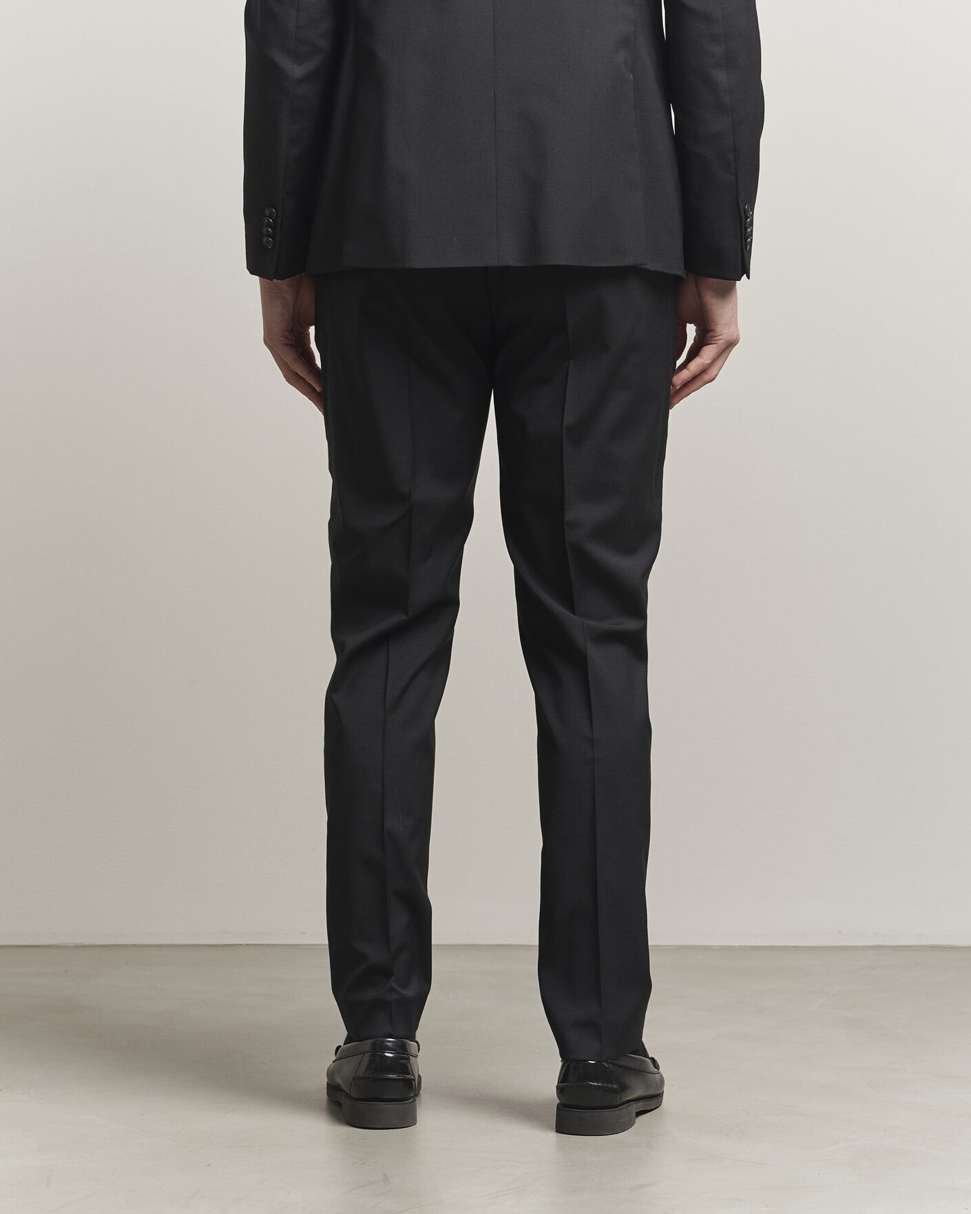 Uomini | Pantaloni | Tiger of Sweden | Tenuta Wool Travel Suit Trousers Black