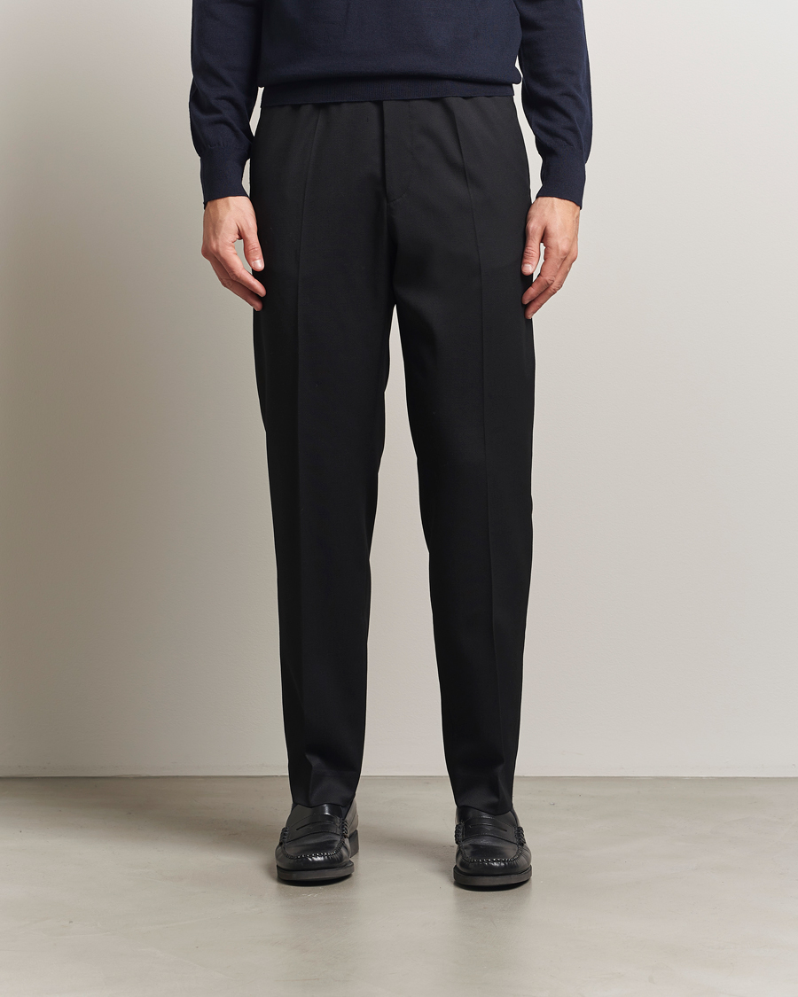 Uomini | Pantaloni | Filippa K | Relaxed Terry Wool Trousers Black