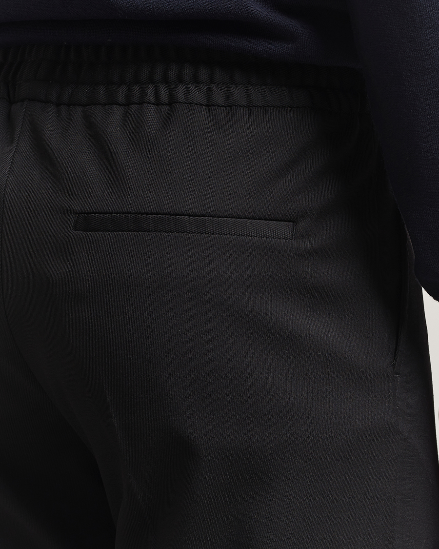 Uomini | Pantaloni | Filippa K | Relaxed Terry Wool Trousers Black