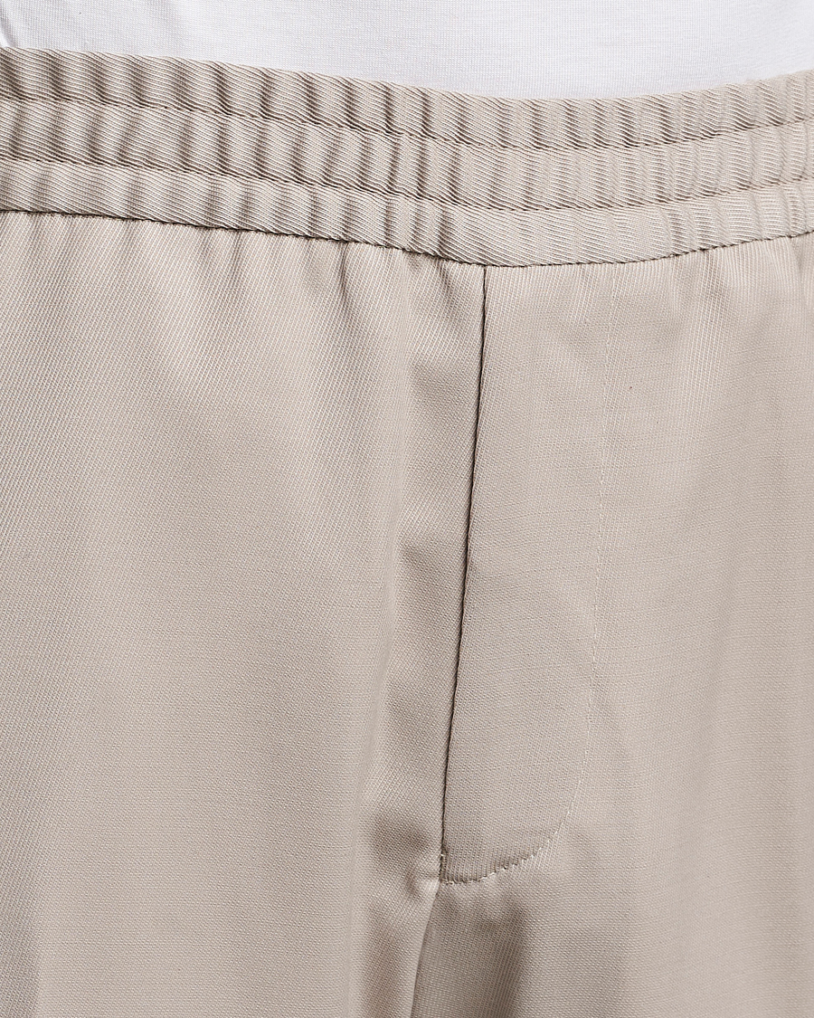 Uomini | Pantaloni | Filippa K | Relaxed Terry Wool Trousers Grey Beige