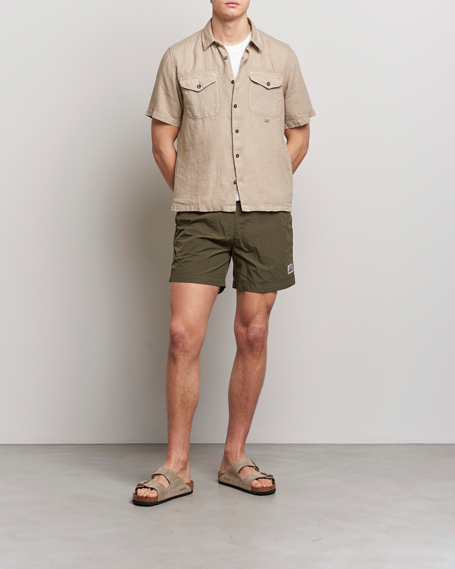 Uomini | Costumi da bagno | C.P. Company | Flatt Nylon Garment Dyed Swimshorts Olive
