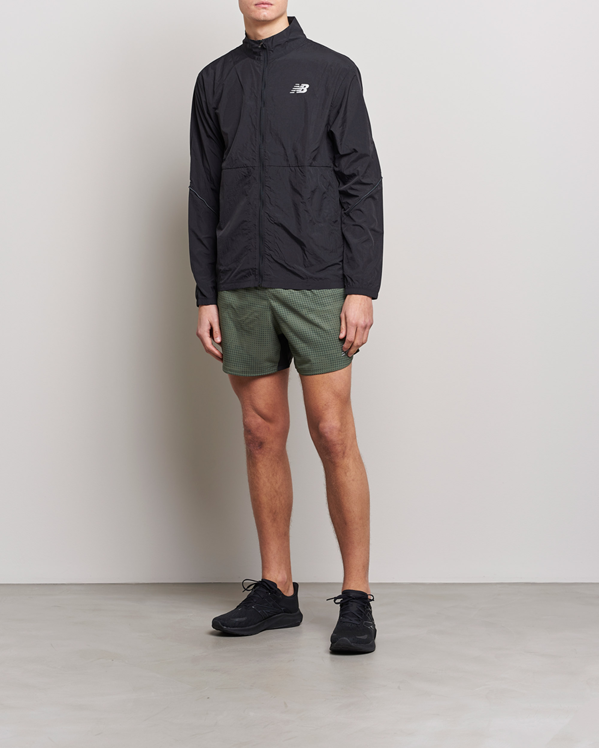 Uomini | Pantaloncini | New Balance Running | Impact Run 5 Inch Shorts Deep Olive