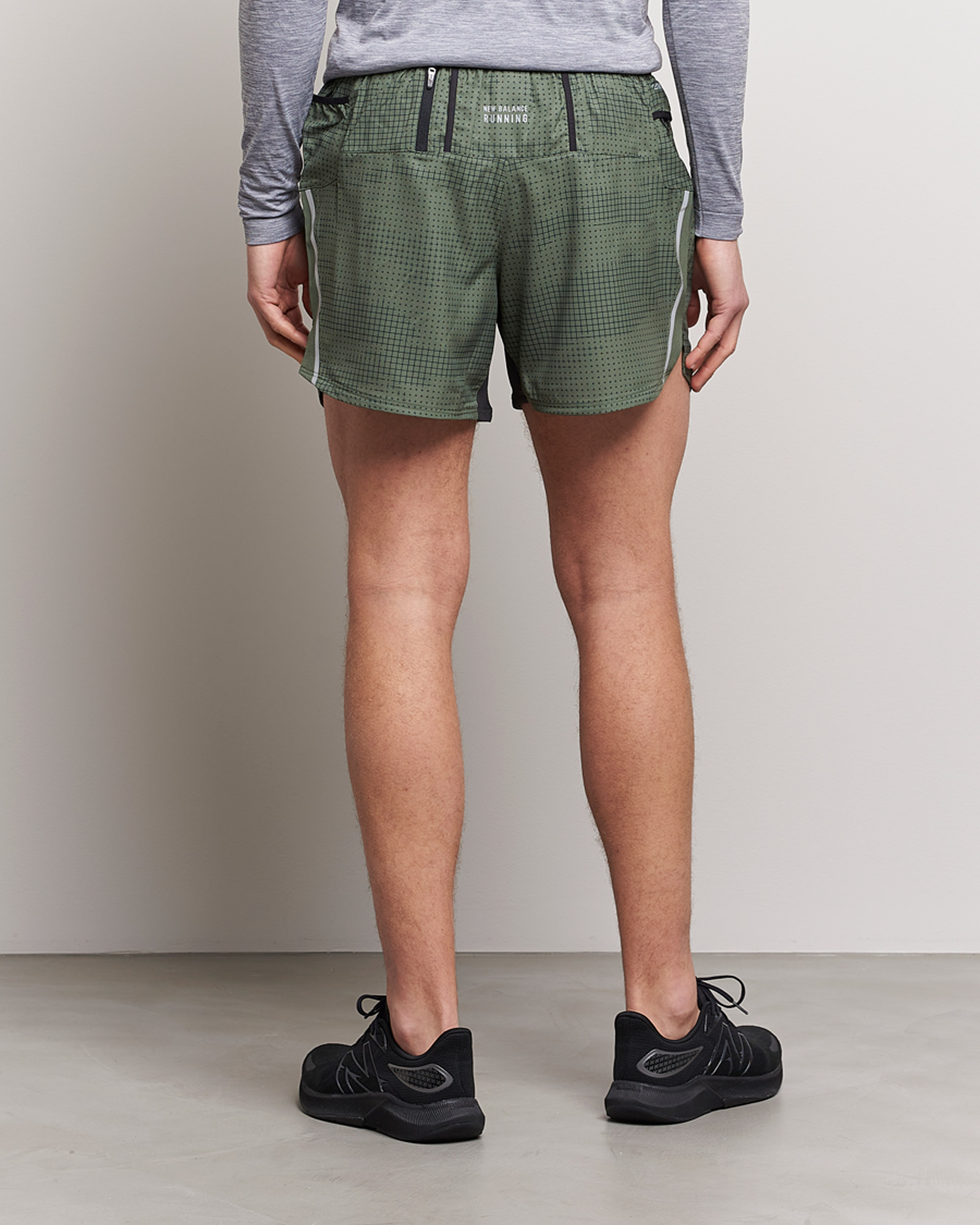 Uomini | Pantaloncini | New Balance Running | Impact Run 5 Inch Shorts Deep Olive