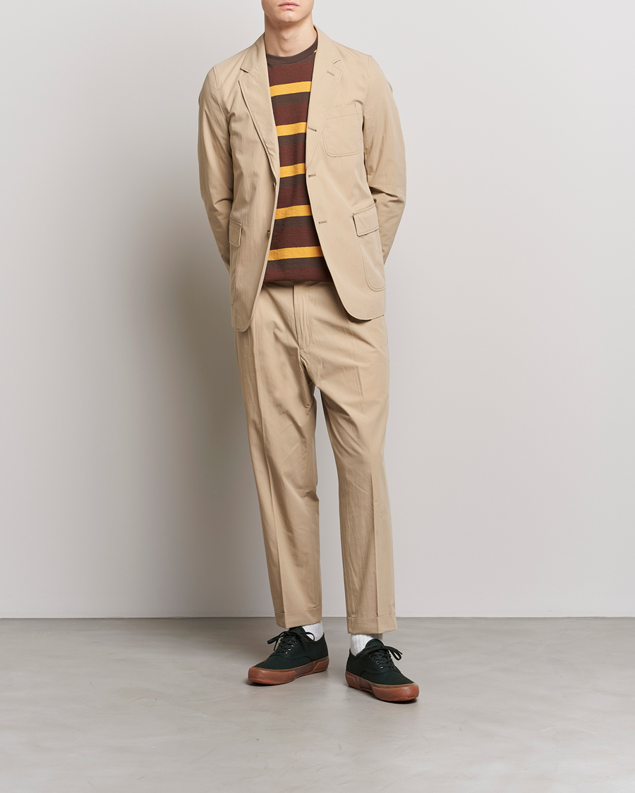 Uomini | Pantaloni | BEAMS PLUS | Comfort Cloth Travel Trousers Beige