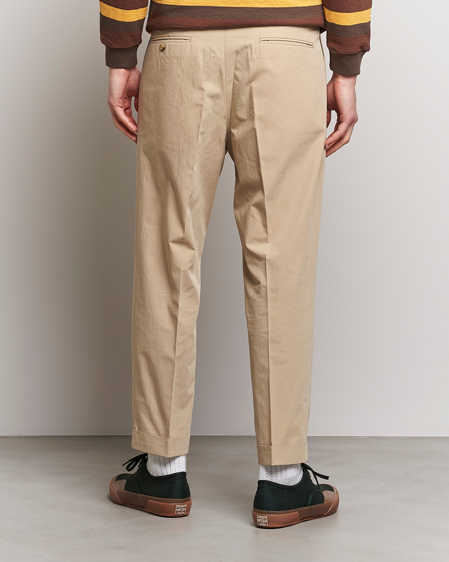 Uomini | Pantaloni | BEAMS PLUS | Comfort Cloth Travel Trousers Beige