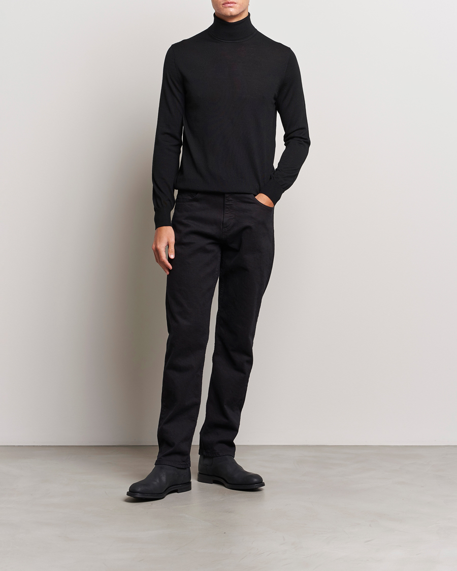 Uomini | Maglieria | Tiger of Sweden | Nevile Extra Fine Merino Polo Black