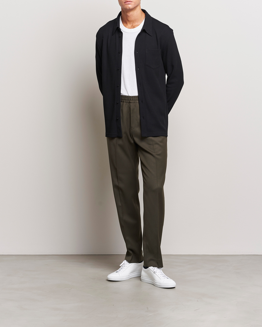 Uomini | Pantaloni | Filippa K | Relaxed Terry Wool Trousers Dark Forest Green