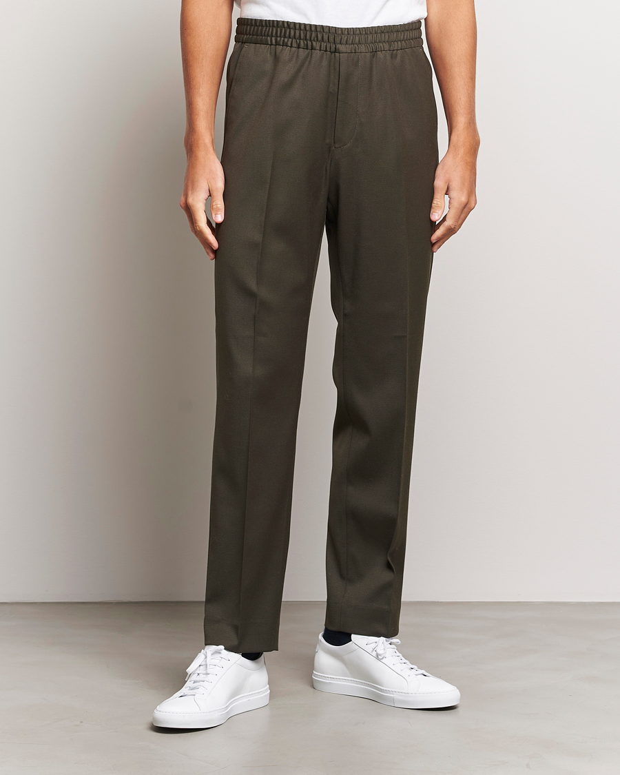 Uomini | Pantaloni | Filippa K | Relaxed Terry Wool Trousers Dark Forest Green