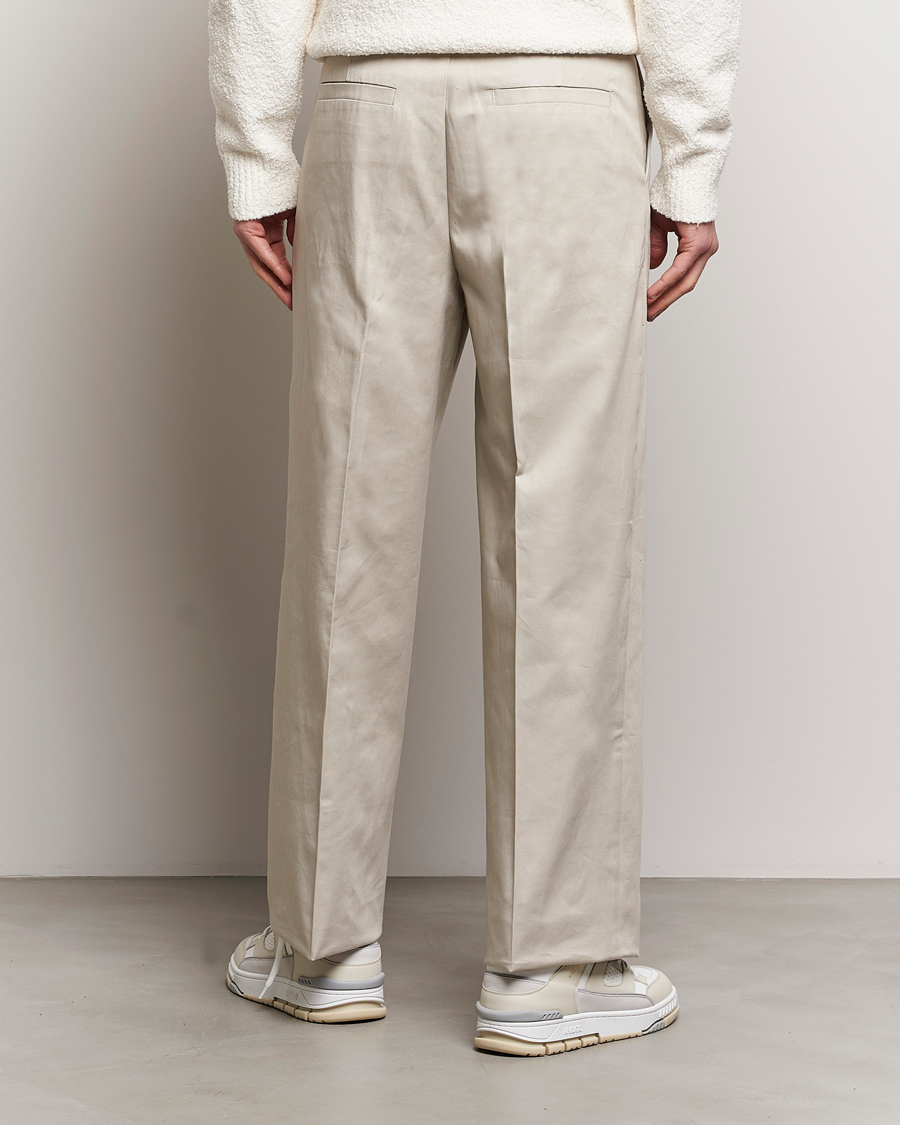 Uomini | Pantaloni | Axel Arigato | Serif Relaxed Fit Trousers Pale Beige