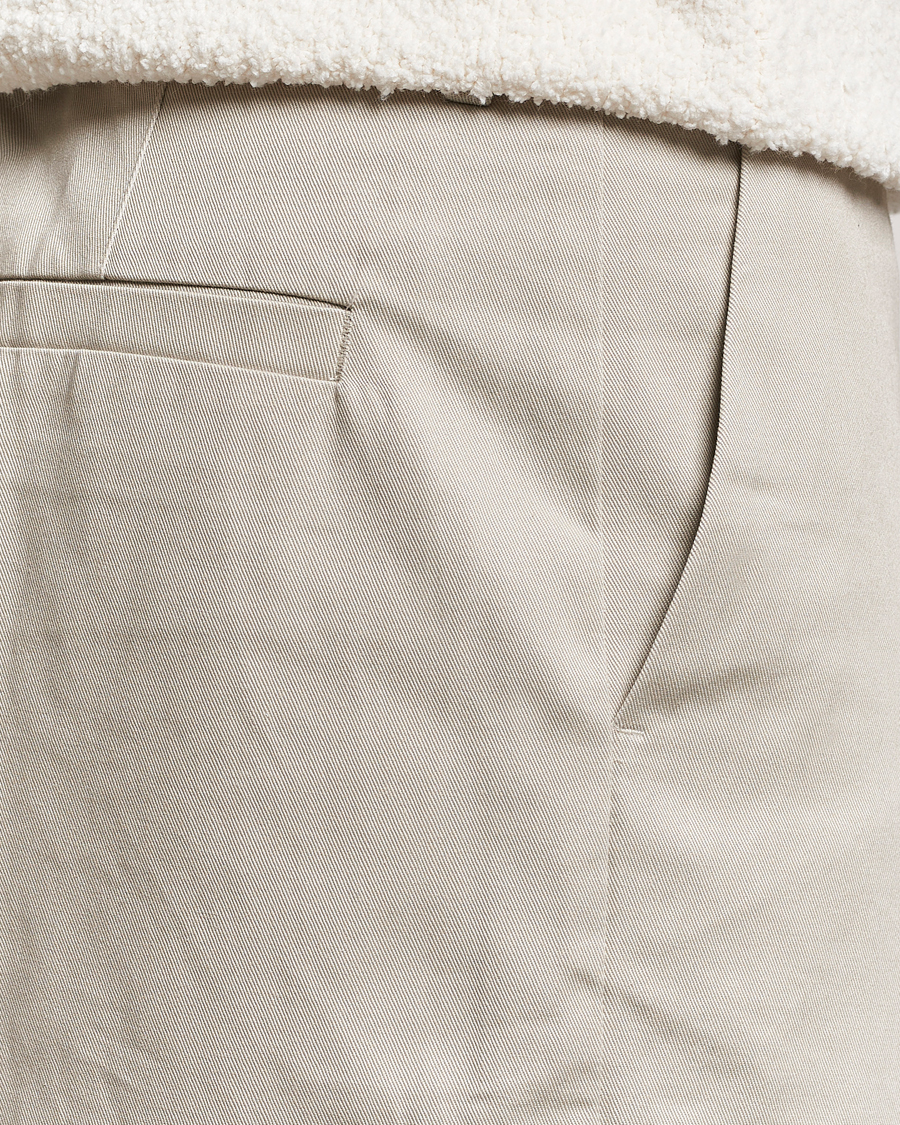 Uomini | Pantaloni | Axel Arigato | Serif Relaxed Fit Trousers Pale Beige