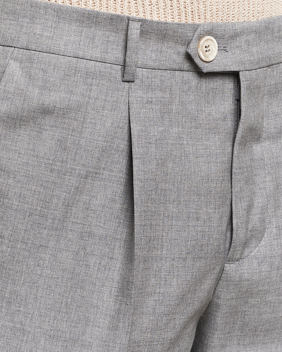 Uomini | Pantaloni | Brunello Cucinelli | Pleated Wool Trousers Light Grey
