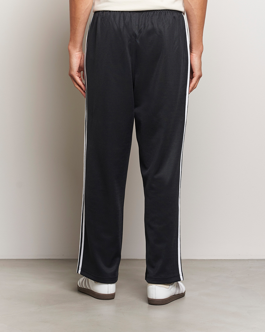 Uomini | Pantaloni | adidas Originals | Firebird Baggy Pant Black