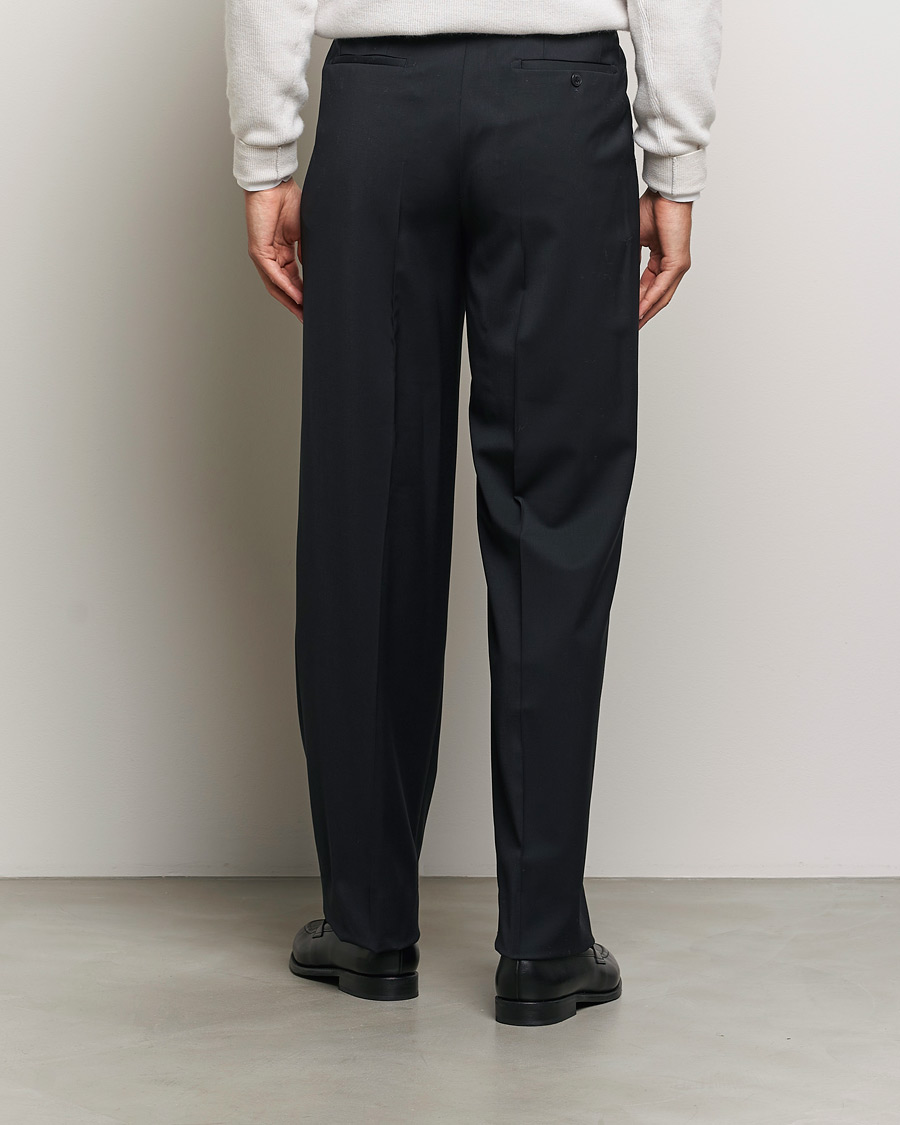 Uomini | Pantaloni | Brioni | Pleated Wool Trousers Navy