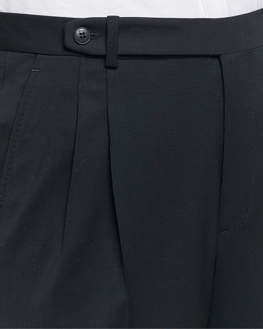 Uomini | Pantaloni | Brioni | Pleated Wool Trousers Navy