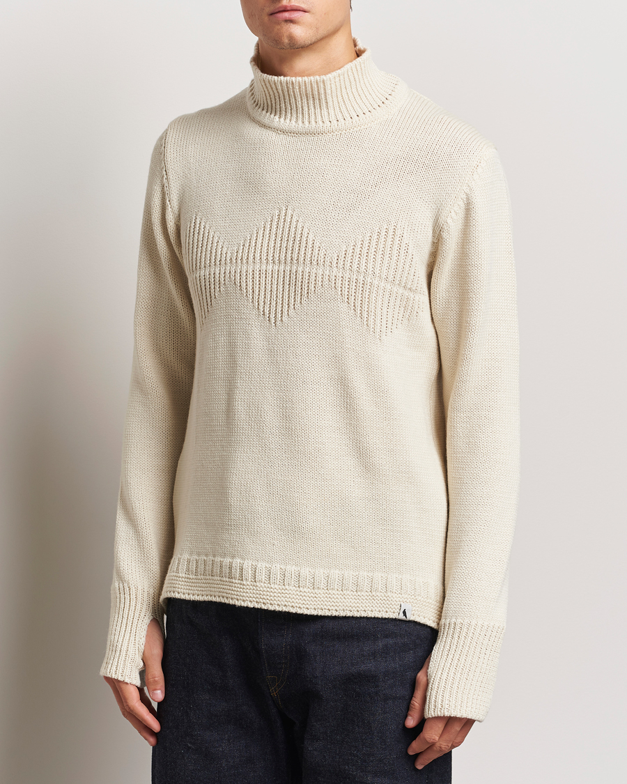 Uomini | Maglieria | Peregrine | Mountain Guernsey Merino Funnel Neck Cream
