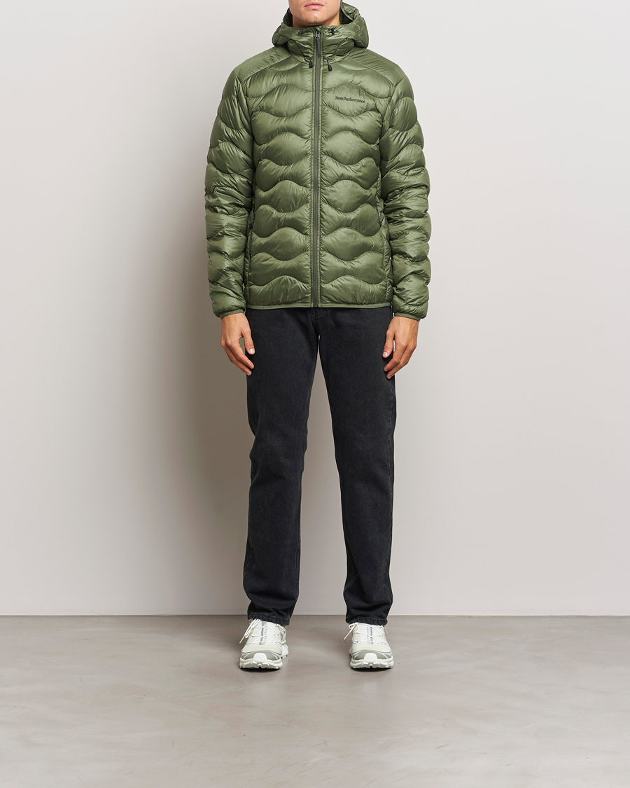 Uomini | Giacche | Peak Performance | Helium Down Hooded Jacket Pine Needle