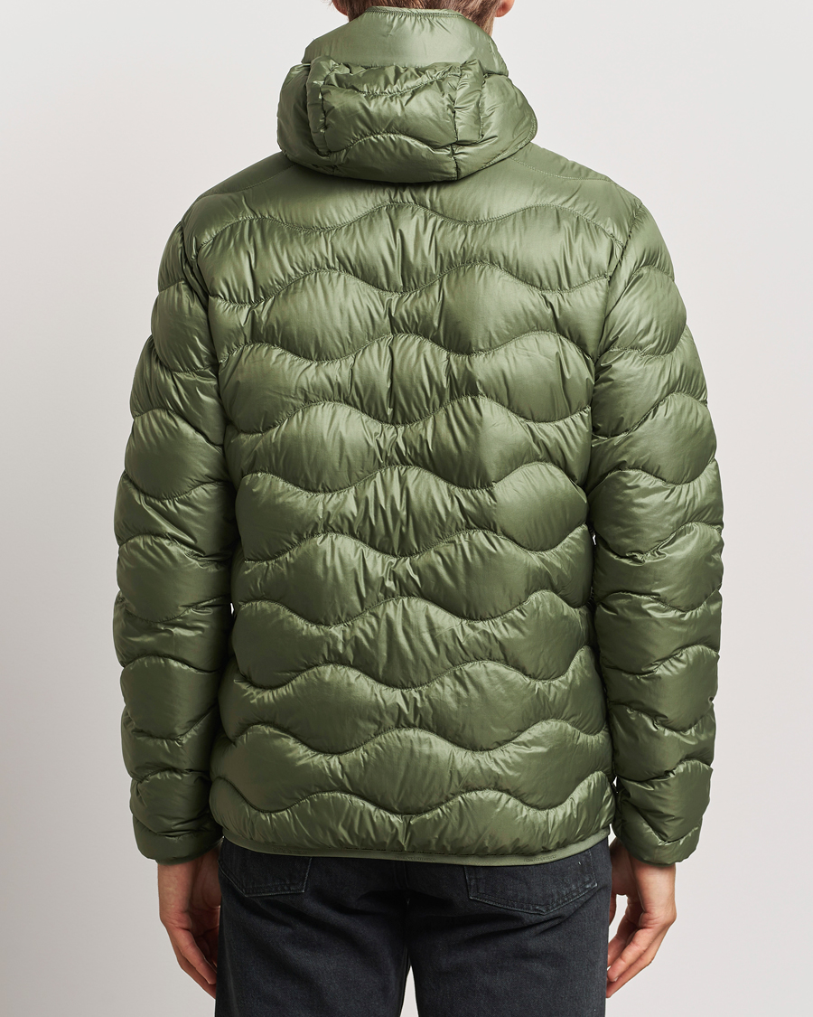 Uomini | Giacche | Peak Performance | Helium Down Hooded Jacket Pine Needle