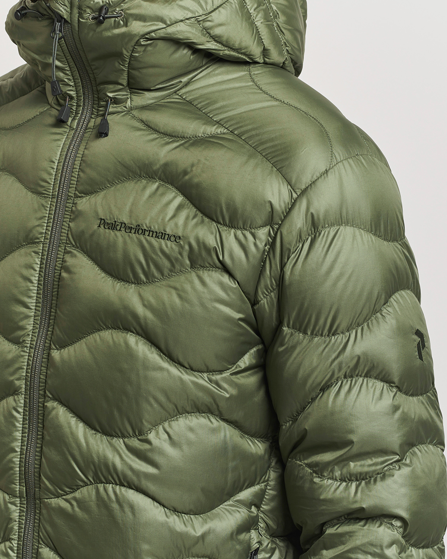 Uomini | Giacche | Peak Performance | Helium Down Hooded Jacket Pine Needle