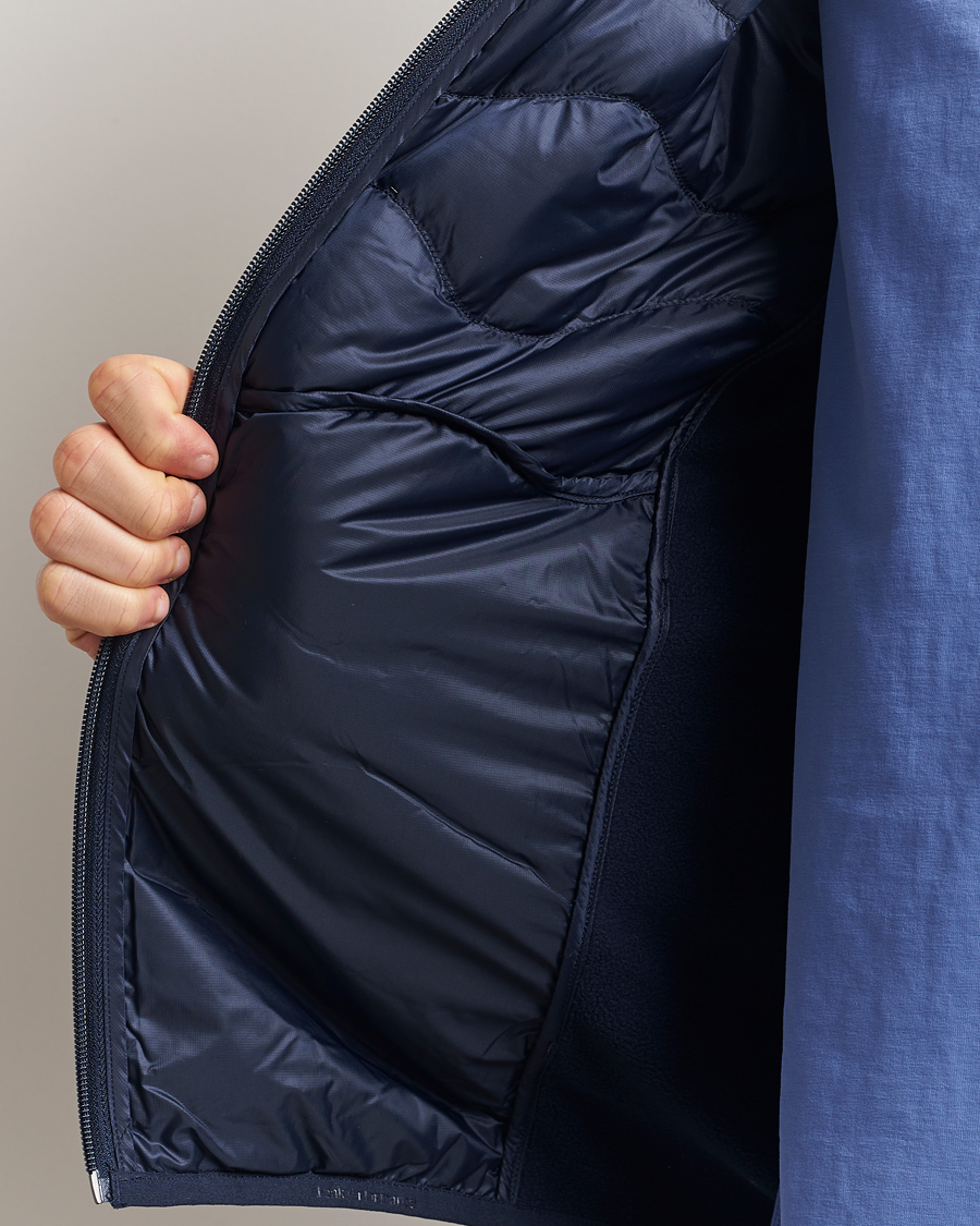 Uomini | Giacche | Peak Performance | Helium Down Hooded Hybrid Jacket Blue Shadow