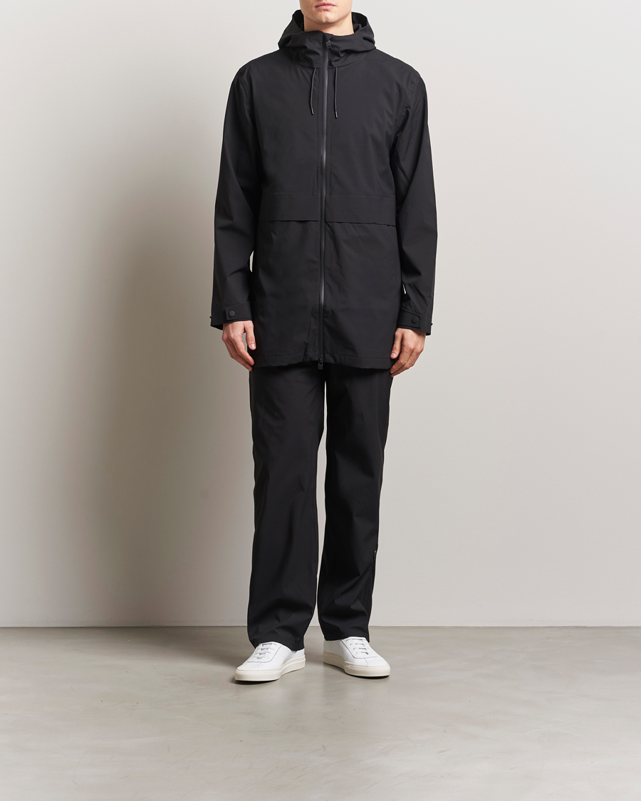 Uomini | Giacche | RAINS | Suva Hooded Waterproof Long Jacket Black