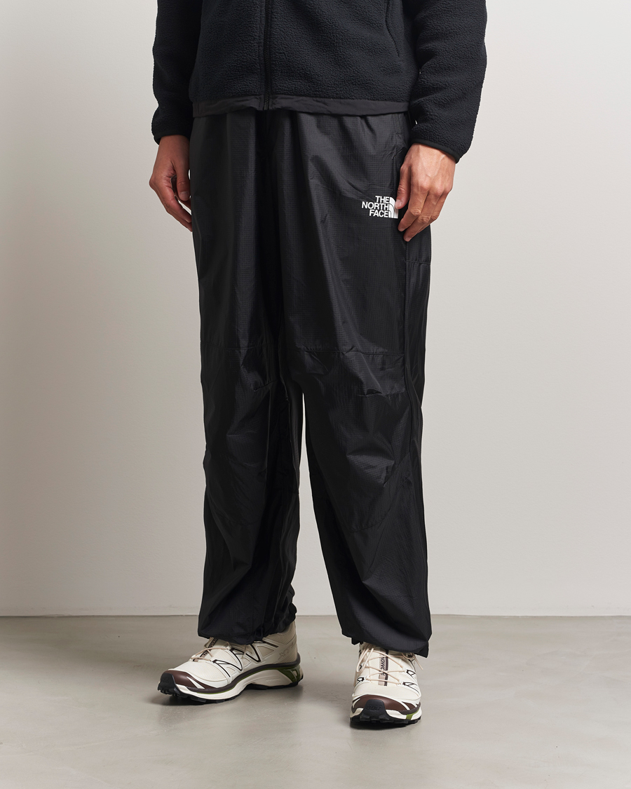 Uomini | Pantaloni | The North Face | NSE Wind Track Pants Black