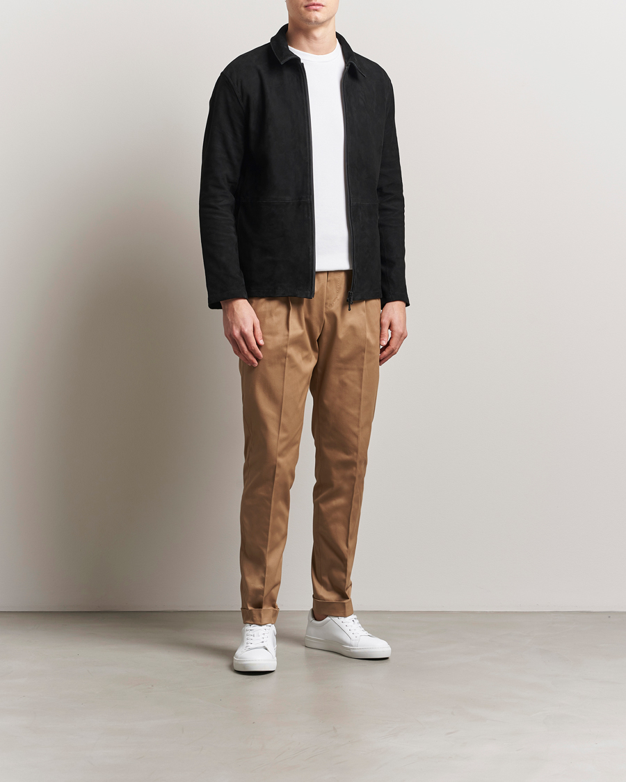 Uomini | Pantaloni | Tiger of Sweden | Tenuta Pleated Cotton Trousers Beige