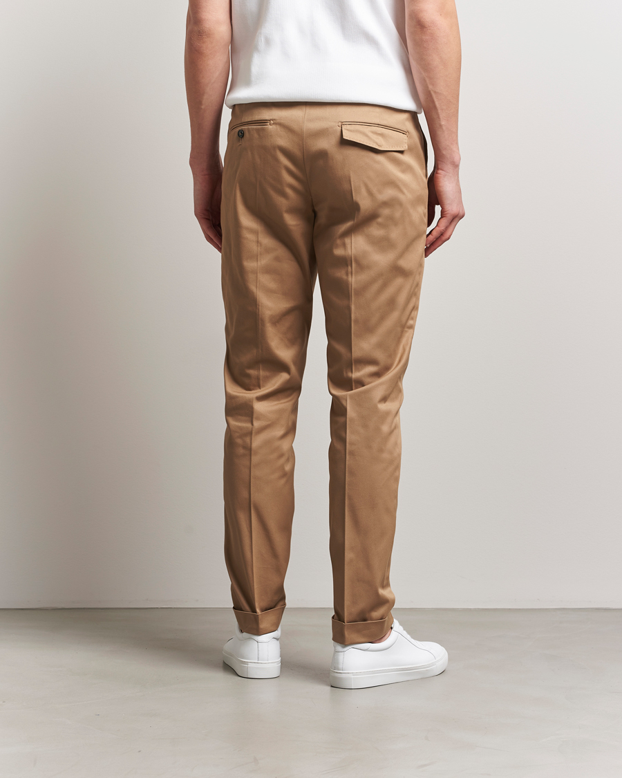 Uomini | Pantaloni | Tiger of Sweden | Tenuta Pleated Cotton Trousers Beige