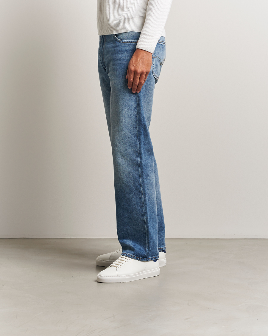 Uomini | Axel Arigato Clean 90 Sneaker White/Blue | Axel Arigato | Clean 90 Sneaker White/Blue