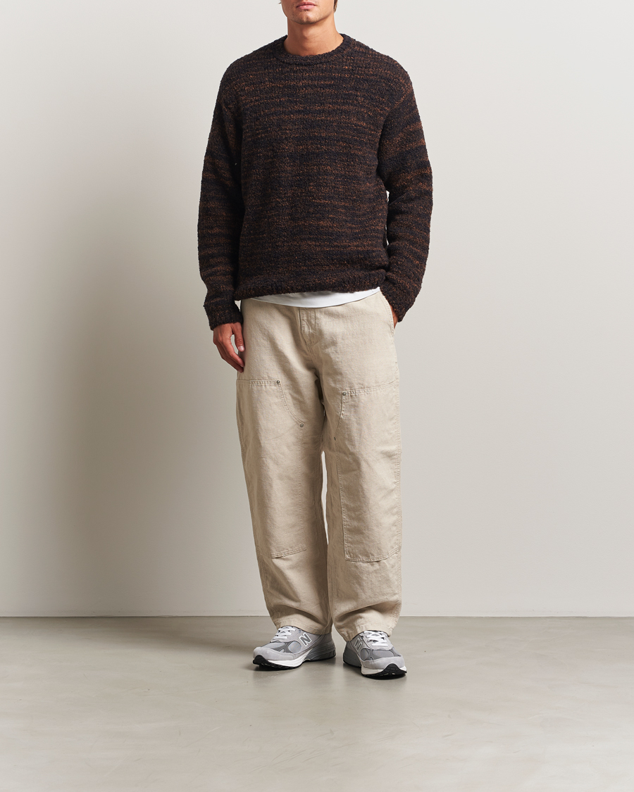 Uomini | Maglieria | Nudie Jeans | Gurra Bouclé Knitted Sweater Black/Brown