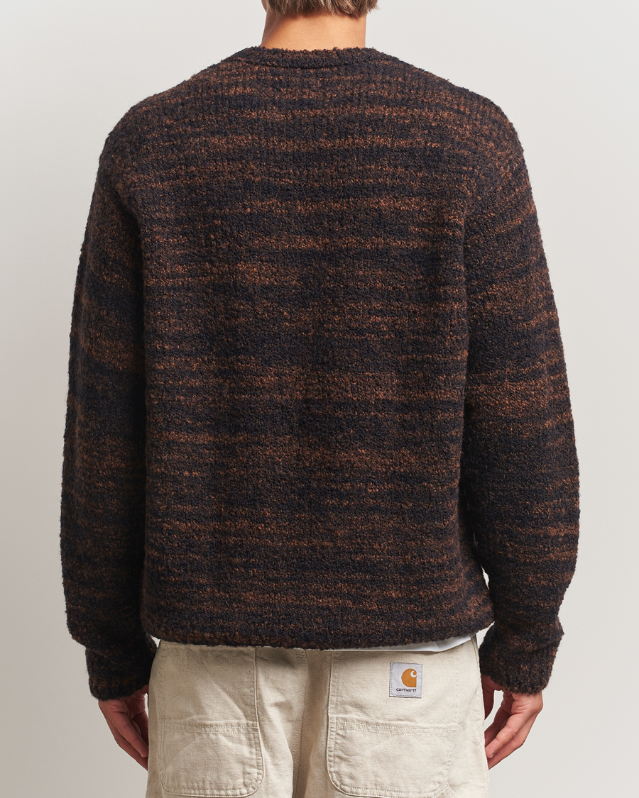 Uomini | Maglieria | Nudie Jeans | Gurra Bouclé Knitted Sweater Black/Brown