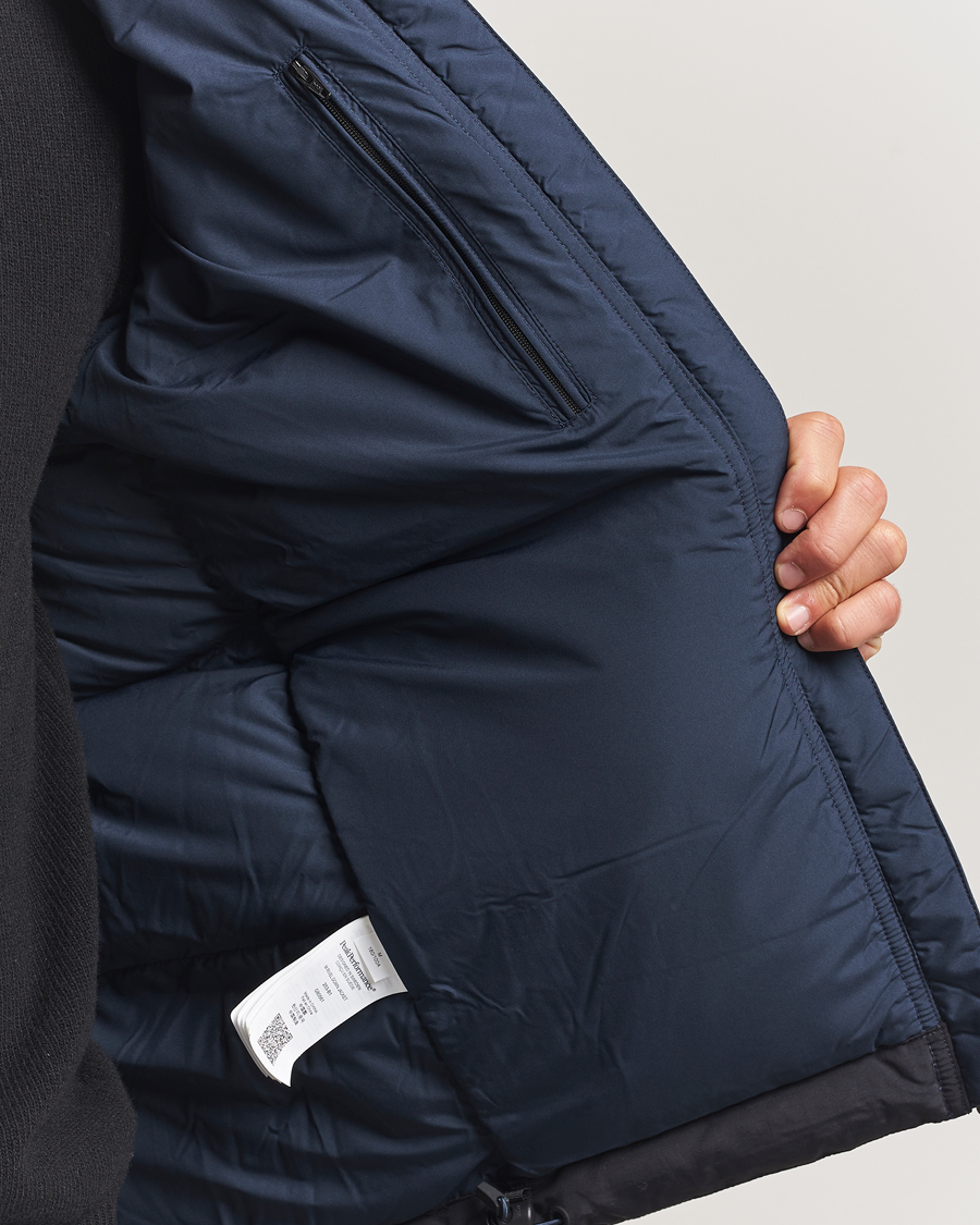 Uomini | Giacche | Peak Performance | Rivel Down Hooded Jacket Blue Shadow