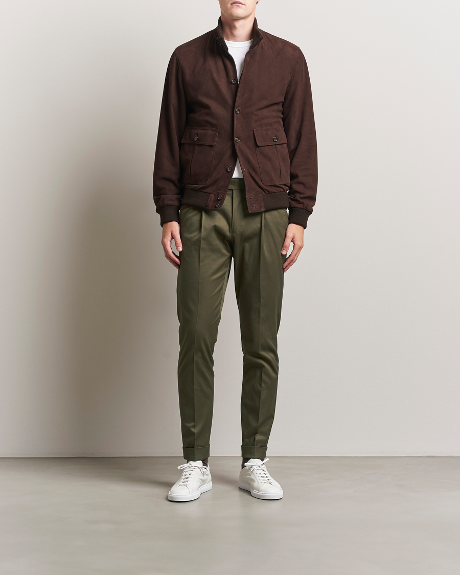 Uomini | Pantaloni | Tiger of Sweden | Tenuta Pleated Cotton Trousers Deep Olive