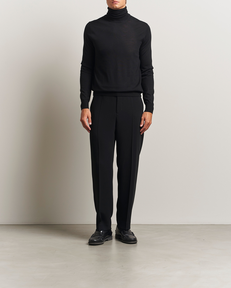 Uomini | Maglieria | Tiger of Sweden | Nevile Extra Fine Merino Polo Black