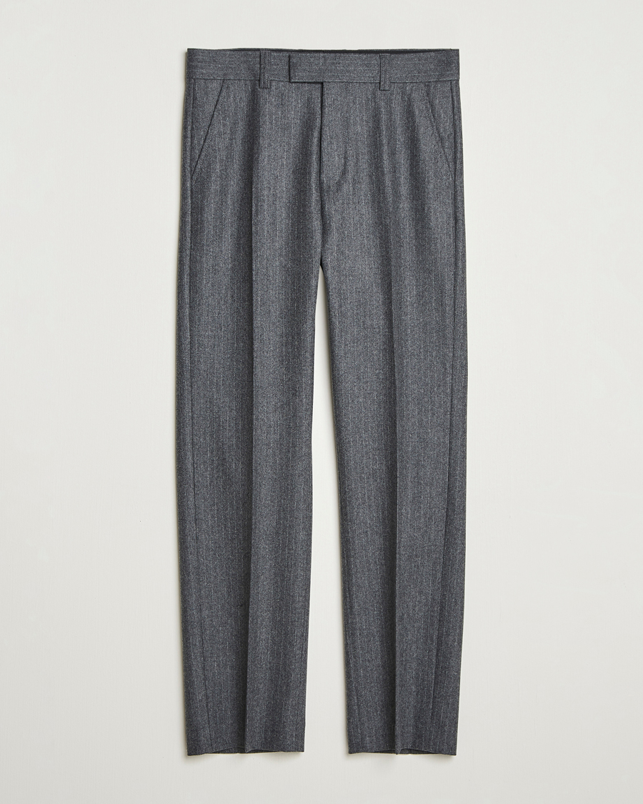 Uomini | Pantaloni | Tiger of Sweden | Tommie Wool Pleated Pinstriped Trousers Silver