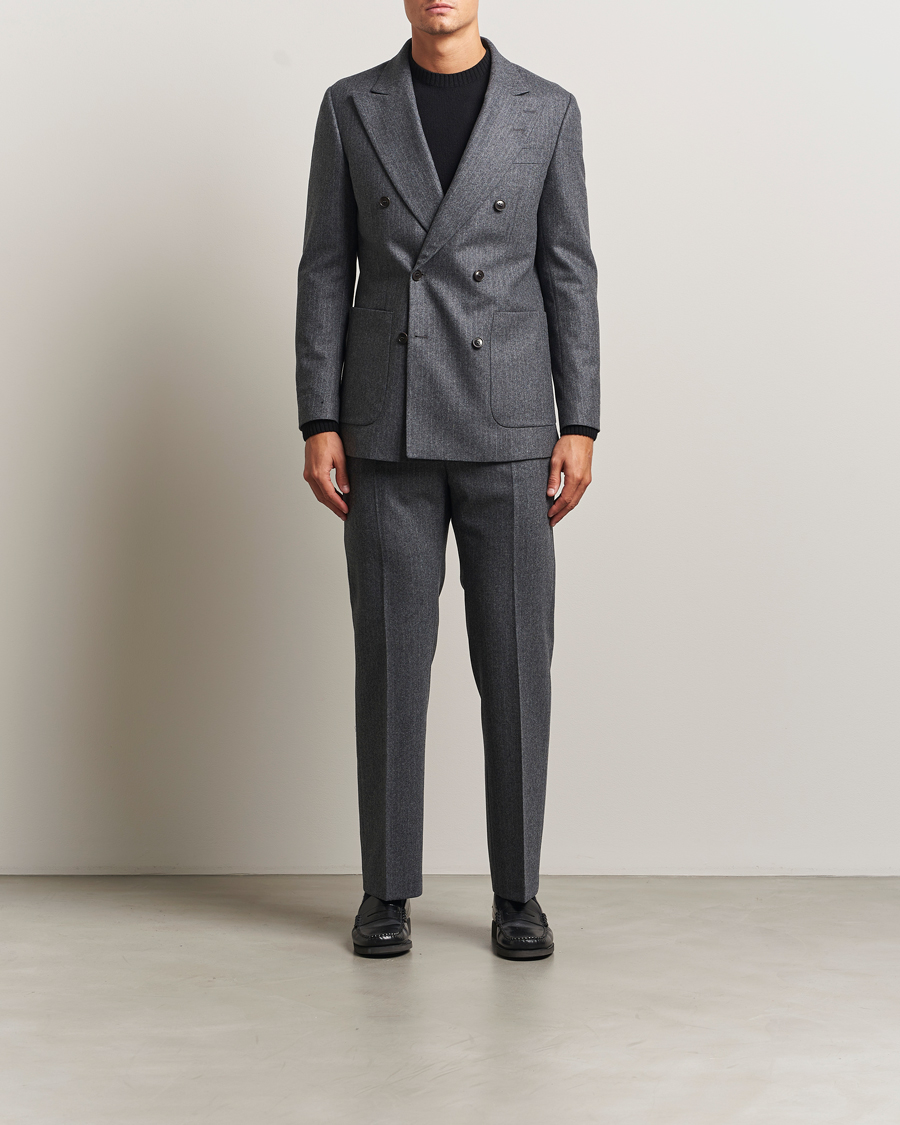 Uomini | Pantaloni | Tiger of Sweden | Tommie Wool Pleated Pinstriped Trousers Silver