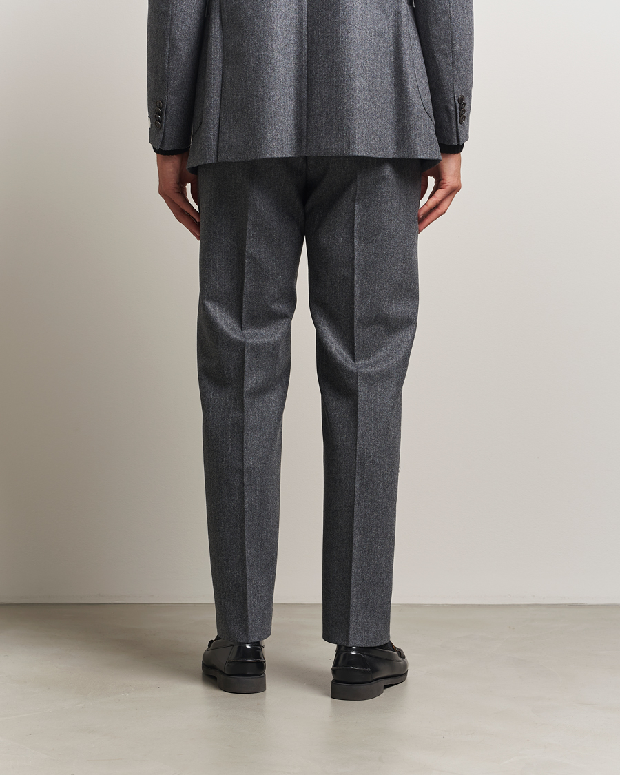Uomini | Pantaloni | Tiger of Sweden | Tommie Wool Pleated Pinstriped Trousers Silver