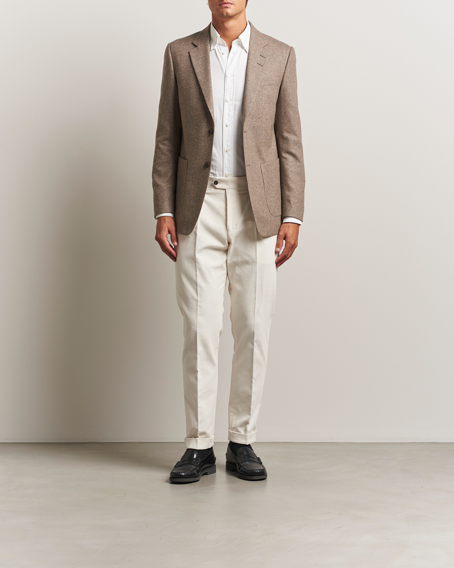Uomini | Pantaloni | Tiger of Sweden | Tenuta Pleated Corduroy Trousers Light Ivory